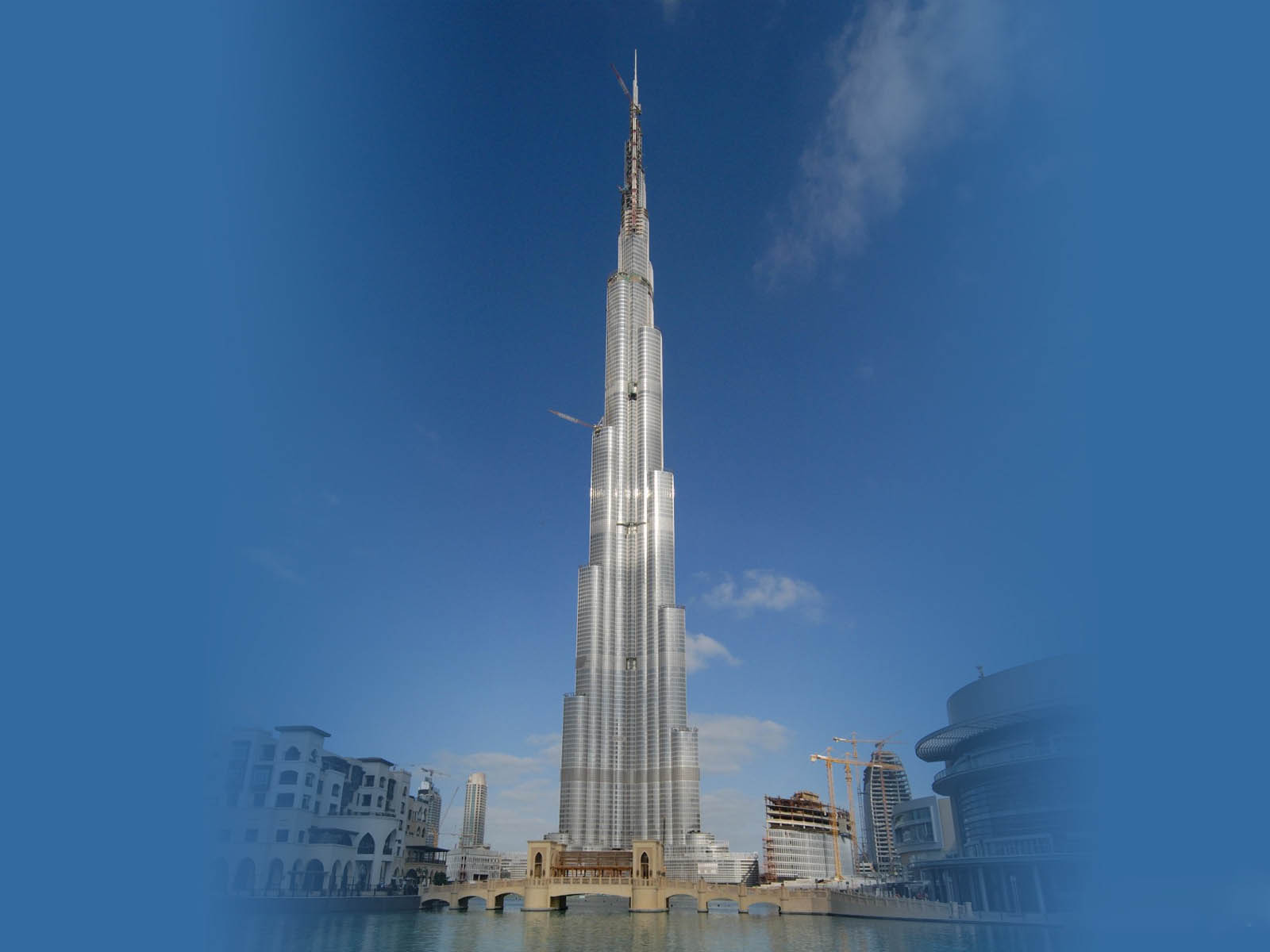Бурдж халифа билеты сайт. Додж Халифа Дубай. Верхушка Бурдж Халифа. Презентация башня Бурдж Халифа. Башенный кран Бурдж Халифа.